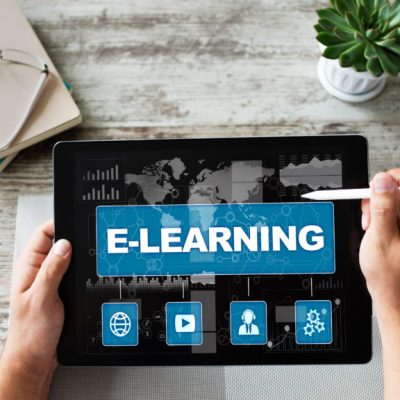 E-learning, online education concept on device screen.