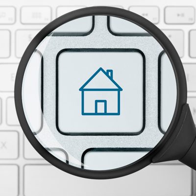 House icon under the magnifying glass