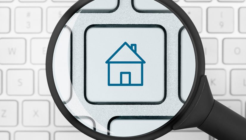 House icon under the magnifying glass