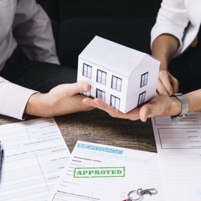 realtor-making-deal-with-customer-in-office
