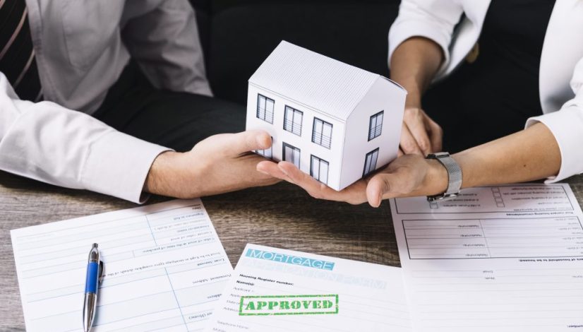realtor-making-deal-with-customer-in-office